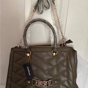 Bebe Khaki Quilted Satchel comes with a attached make up bag